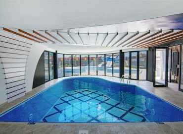 Меблированная трехкомнатная квартира, 70м² в новом элитном комплексе на первой береговой линии Махмутлара, Алания ID-18619 фото-19