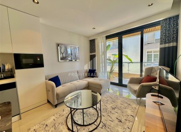 Меблированная квартира с одной спальней, 50м², в новостройке премиум класса в центре Алании, у пляжа Клеопатры ID-18620 фото-3