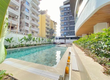 Меблированная квартира с одной спальней, 50м², в новостройке премиум класса в центре Алании, у пляжа Клеопатры ID-18620 фото-15