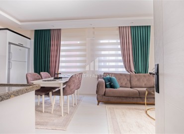 Недорогая недвижимость в Махмутларе, Алания: трехкомнатная квартира, 100м², на центральной улице в 200м от моря ID-18621 фото-3