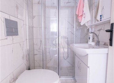 Недорогая недвижимость в Махмутларе, Алания: трехкомнатная квартира, 100м², на центральной улице в 200м от моря ID-18621 фото-9