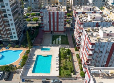 Недорогая недвижимость в Махмутларе, Алания: трехкомнатная квартира, 100м², на центральной улице в 200м от моря ID-18621 фото-18