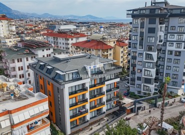 Двухкомнатные апартаменты, 60м², в современной резиденции с инфраструктурой в центре Алании, 550м от моря ID-18623 фото-1