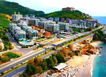 Меблированные апартаменты 1+1, 65м², в элитном комплексе с собственным пляжем в Каргыджаке, Алания ID-18625 фото-1