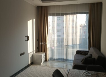 New one-bedroom unfurnished apartment, 500 meters from the sea, in a residence with a winter pool, in the center of Alanya ID-16766 фото-3