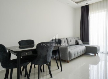 Двухкомнатные меблированные апартаменты, 55м², в комплексе с инфраструктурой, в Махмутларе, Алания ID-18638 фото-2