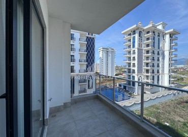 Двухкомнатные меблированные апартаменты, 55м², в комплексе с инфраструктурой, в Махмутларе, Алания ID-18638 фото-12