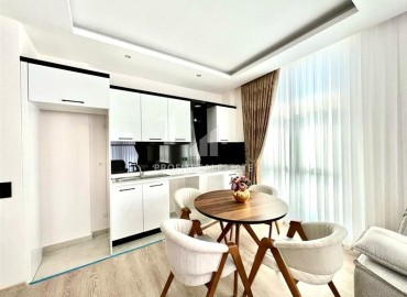 Элегантная квартира с одной спальней, 50м², в новом комфортабельном комплексе в районе Махмутлар, Алания ID-18639 фото-3