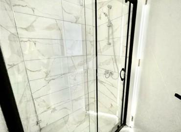 Элегантная квартира с одной спальней, 50м², в новом комфортабельном комплексе в районе Махмутлар, Алания ID-18639 фото-11