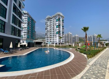 Элегантная квартира с одной спальней, 50м², в новом комфортабельном комплексе в районе Махмутлар, Алания ID-18639 фото-16