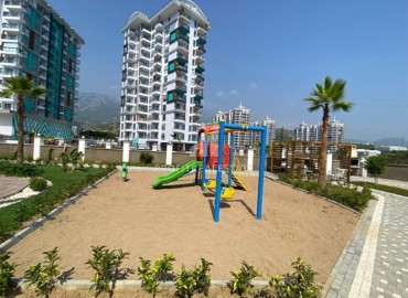 Элегантная квартира с одной спальней, 50м², в новом комфортабельном комплексе в районе Махмутлар, Алания ID-18639 фото-17