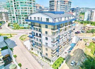 Стильная квартира с одной спальней, 50м², в комплексе с инфраструктурой в Махмутларе, 600м от моря, Алания ID-18645 фото-1