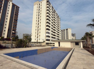 Выгодное предложение в Мерсине: новая двухкомнатная квартира, 70м², с выходом в сад в Тедже, недалеко от моря ID-18653 фото-1