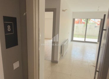 Выгодное предложение в Мерсине: новая двухкомнатная квартира, 70м², с выходом в сад в Тедже, недалеко от моря ID-18653 фото-8