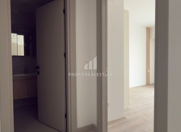 Выгодное предложение в Мерсине: новая двухкомнатная квартира, 70м², с выходом в сад в Тедже, недалеко от моря ID-18653 фото-9