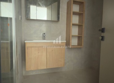 Выгодное предложение в Мерсине: новая двухкомнатная квартира, 70м², с выходом в сад в Тедже, недалеко от моря ID-18653 фото-11