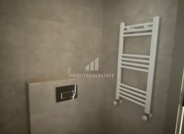 Выгодное предложение в Мерсине: новая двухкомнатная квартира, 70м², с выходом в сад в Тедже, недалеко от моря ID-18653 фото-12