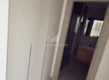 Выгодное предложение в Мерсине: новая двухкомнатная квартира, 70м², с выходом в сад в Тедже, недалеко от моря ID-18653 фото-14