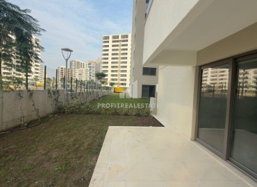 Выгодное предложение в Мерсине: новая двухкомнатная квартира, 70м², с выходом в сад в Тедже, недалеко от моря ID-18653 фото-20