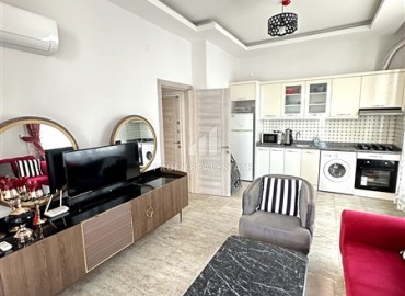 Стильные апартаменты с одной спальней, 55м², в современной резиденции с бассейном, в 250м от моря в Махмутларе, Алания ID-18656 фото-2