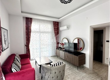 Стильные апартаменты с одной спальней, 55м², в современной резиденции с бассейном, в 250м от моря в Махмутларе, Алания ID-18656 фото-3