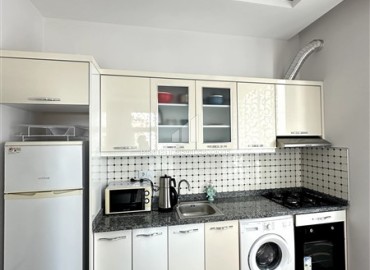 Стильные апартаменты с одной спальней, 55м², в современной резиденции с бассейном, в 250м от моря в Махмутларе, Алания ID-18656 фото-5