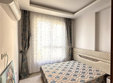 Стильные апартаменты с одной спальней, 55м², в современной резиденции с бассейном, в 250м от моря в Махмутларе, Алания ID-18656 фото-6