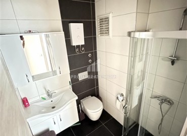 Стильные апартаменты с одной спальней, 55м², в современной резиденции с бассейном, в 250м от моря в Махмутларе, Алания ID-18656 фото-8