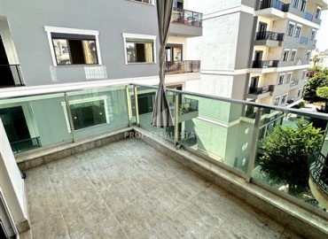 Стильные апартаменты с одной спальней, 55м², в современной резиденции с бассейном, в 250м от моря в Махмутларе, Алания ID-18656 фото-9