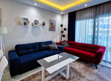 Комфортабельные двухкомнатные апартаменты, 65м², с остекленным балконом в 350м от моря в Махмутларе, Алания ID-18657 фото-2