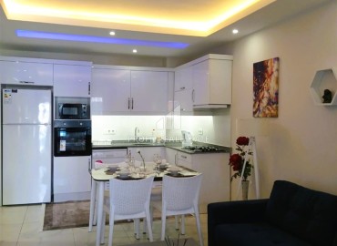 Комфортабельные двухкомнатные апартаменты, 65м², с остекленным балконом в 350м от моря в Махмутларе, Алания ID-18657 фото-3