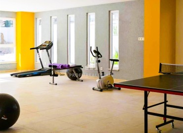 Комфортабельные двухкомнатные апартаменты, 65м², с остекленным балконом в 350м от моря в Махмутларе, Алания ID-18657 фото-13