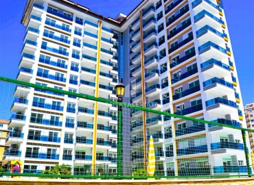 Комфортабельные двухкомнатные апартаменты, 65м², с остекленным балконом в 350м от моря в Махмутларе, Алания ID-18657 фото-19