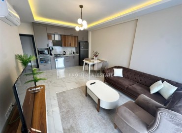 Двухкомнатная квартира с дизайнерским интерьером, 50м², в новостройке с бассейном в районе Махмутлар, Алания ID-18658 фото-2