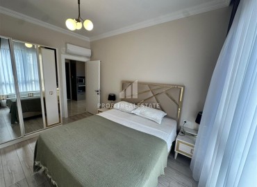 Двухкомнатная квартира с дизайнерским интерьером, 50м², в новостройке с бассейном в районе Махмутлар, Алания ID-18658 фото-11