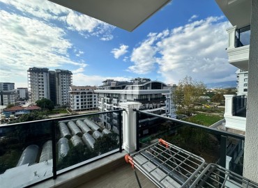 Двухкомнатная квартира с дизайнерским интерьером, 50м², в новостройке с бассейном в районе Махмутлар, Алания ID-18658 фото-14