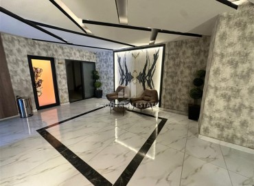 Двухкомнатная квартира с дизайнерским интерьером, 50м², в новостройке с бассейном в районе Махмутлар, Алания ID-18658 фото-16