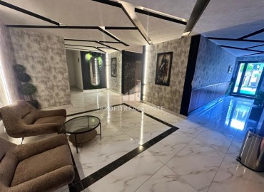 Двухкомнатная квартира с дизайнерским интерьером, 50м², в новостройке с бассейном в районе Махмутлар, Алания ID-18658 фото-17