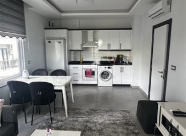 Уютные апартаменты 1+1, 55м², в комплексе с хорошей инфраструктурой, недалеко от моря в Махмутларе, Алания ID-18659 фото-2