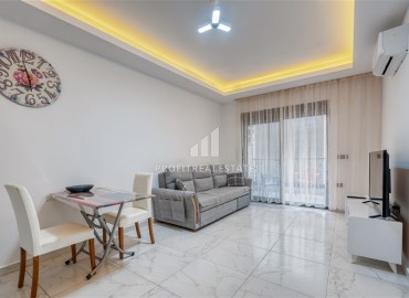 Квартира с одной спальней, 55м², с лаконичным интерьером в новой резиденции с бассейном в Махмутларе, Алания ID-18660 фото-2