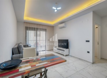 Квартира с одной спальней, 55м², с лаконичным интерьером в новой резиденции с бассейном в Махмутларе, Алания ID-18660 фото-5