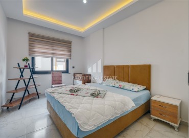 Квартира с одной спальней, 55м², с лаконичным интерьером в новой резиденции с бассейном в Махмутларе, Алания ID-18660 фото-9