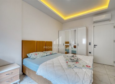 Квартира с одной спальней, 55м², с лаконичным интерьером в новой резиденции с бассейном в Махмутларе, Алания ID-18660 фото-10