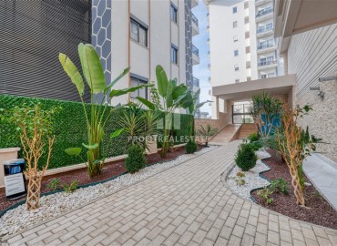 Квартира с одной спальней, 55м², с лаконичным интерьером в новой резиденции с бассейном в Махмутларе, Алания ID-18660 фото-17