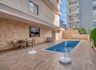 Квартира с одной спальней, 55м², с лаконичным интерьером в новой резиденции с бассейном в Махмутларе, Алания ID-18660 фото-18