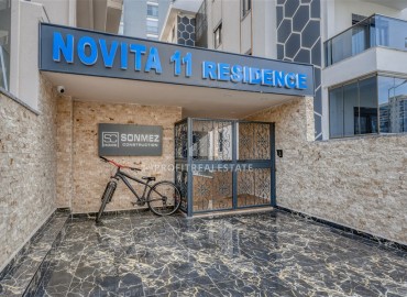 Квартира с одной спальней, 55м², с лаконичным интерьером в новой резиденции с бассейном в Махмутларе, Алания ID-18660 фото-19