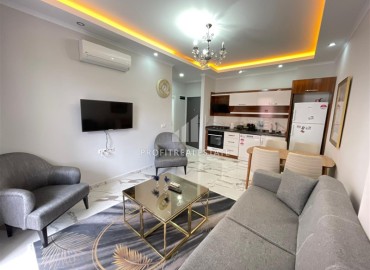 Стильные апартаменты 1+1 с дизайнерским интерьером, 55м², в новом комплексе премиум класса в Махмутларе, Алания ID-18662 фото-5