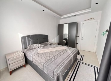 Элегантная квартира с одной спальней, 55м², в новой элитной резиденции в Махмутларе, Алания, 600м от моря ID-18664 фото-12