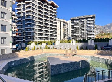 Элегантная квартира с одной спальней, 55м², в новой элитной резиденции в Махмутларе, Алания, 600м от моря ID-18664 фото-19