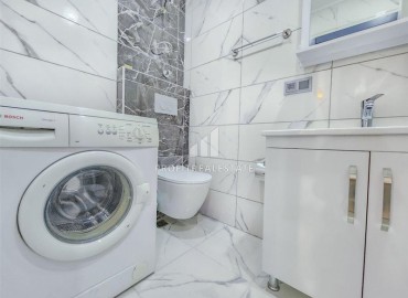 Элегантные двухкомнатные апартаменты, 50м², в новом комфортабельном комплексе в Авсалларе, Алания ID-18666 фото-8